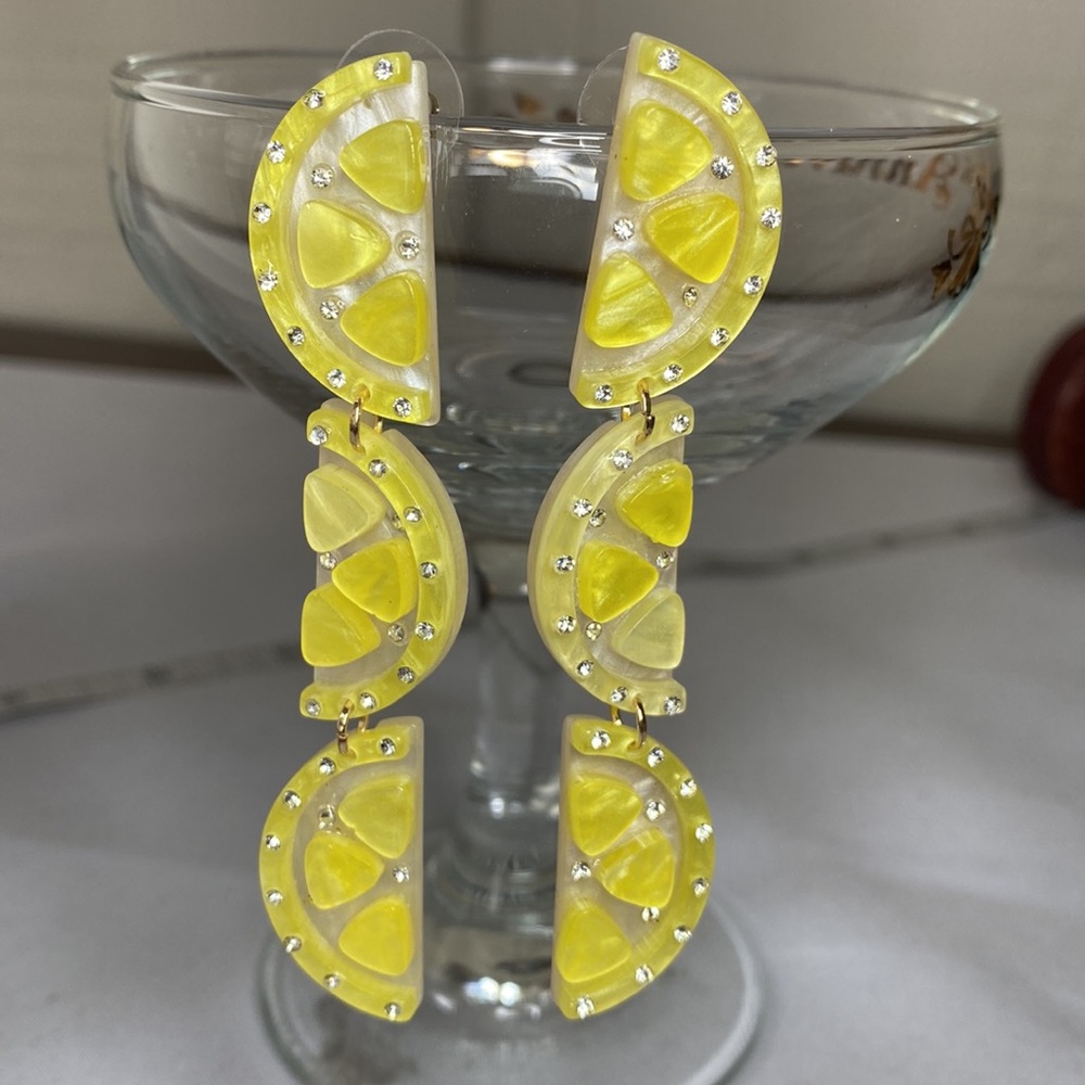 Dangling lemon halves earrings with rhinestones
